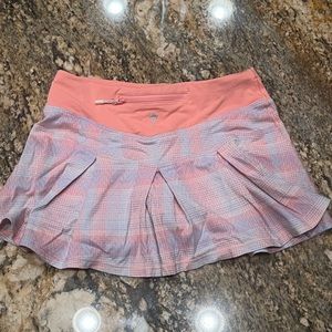 Tennis skirt. Brand ivivva. Colors pink and blue. Size 8